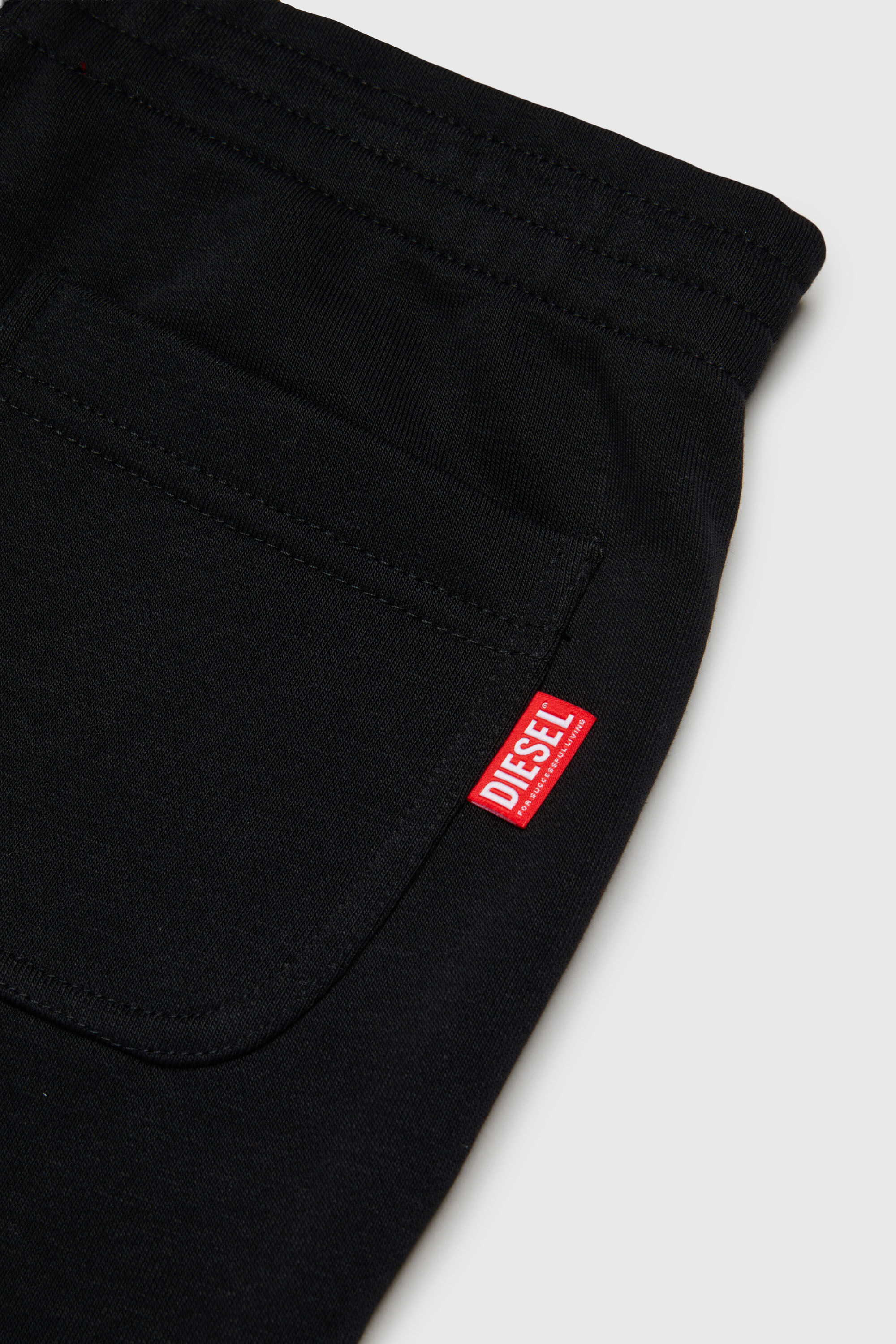 Diesel - PRES, Man's Sweatpants with cut-off logo print in Black - 4
