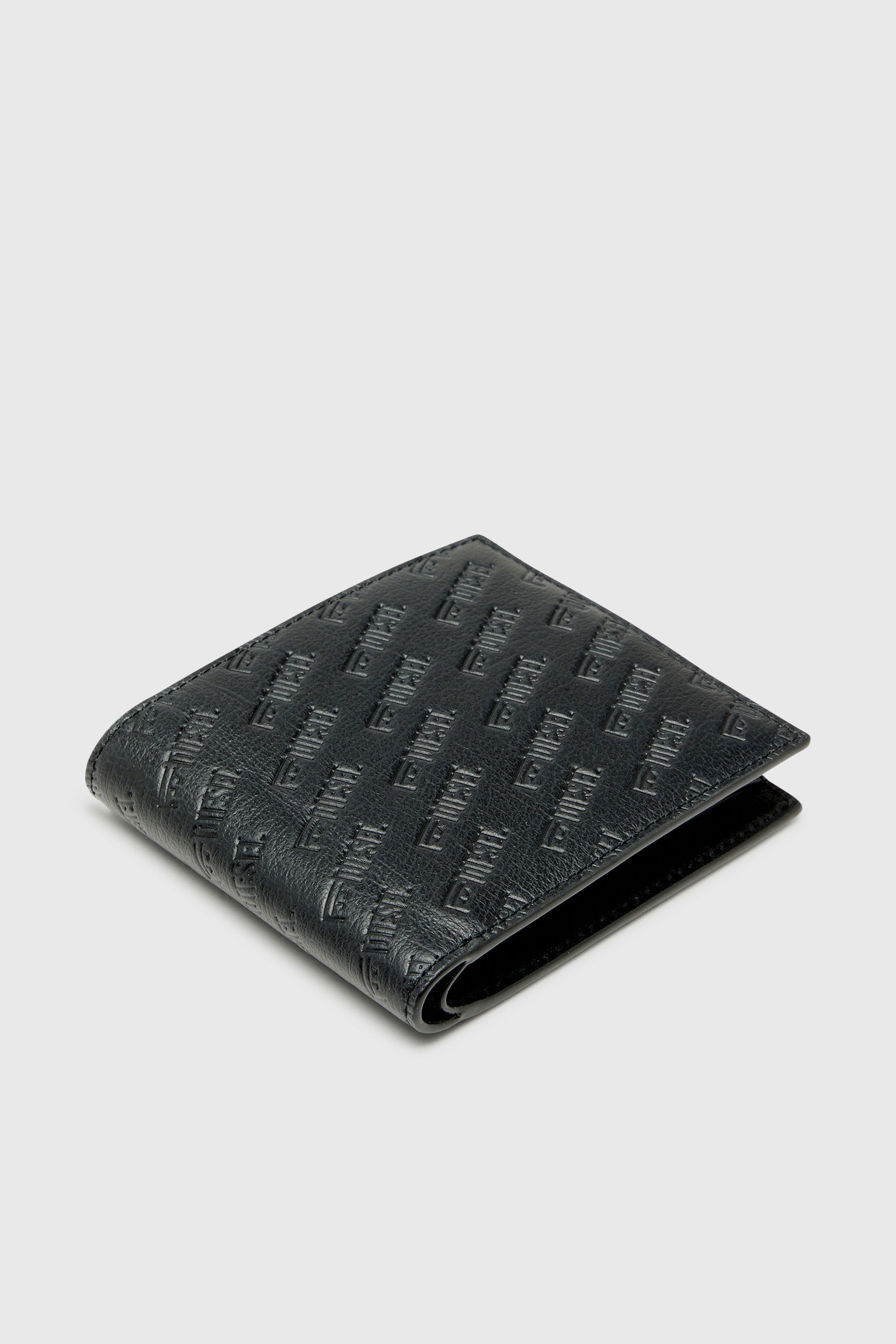 Diesel - MONOGRAM BI-FOLD COIN S 3D, Man's Leather bi-fold wallet with all-over embossed logo in Black - 4