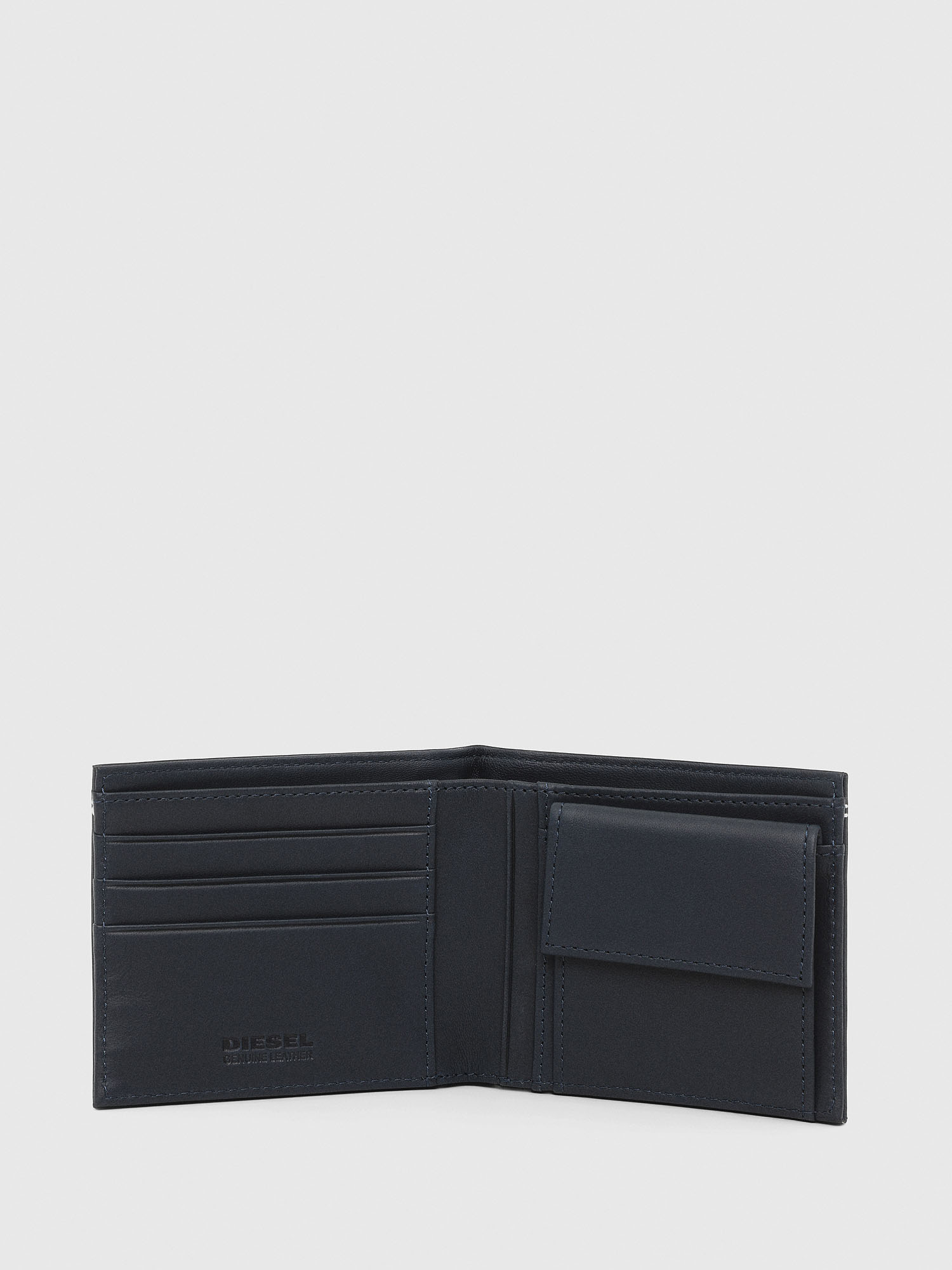 HIRESH S Man: Bi-fold wallet with Copyright detail | Diesel