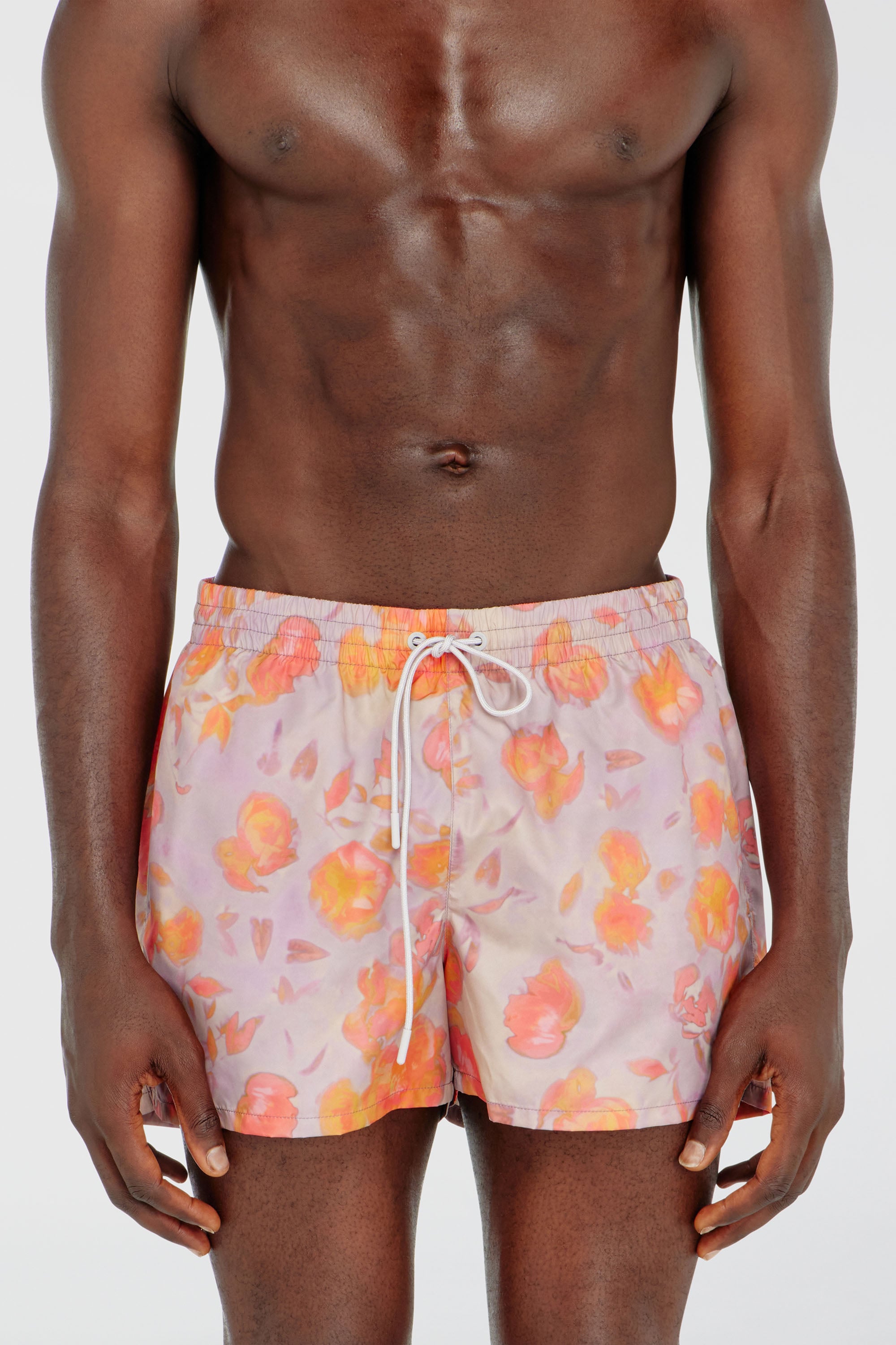 Metallic swim shorts with floral print