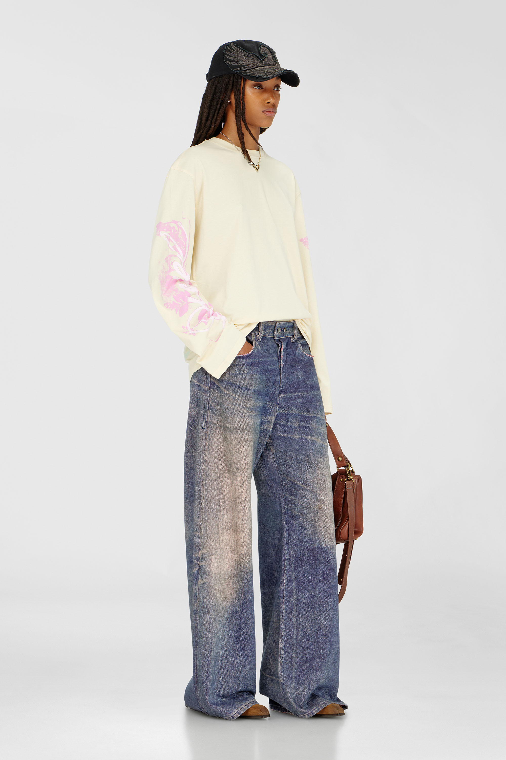 Diesel - T-HILARY-LS-AA3, Woman's Long-sleeve T-shirt with graphic prints and crystals in Yellow - 1